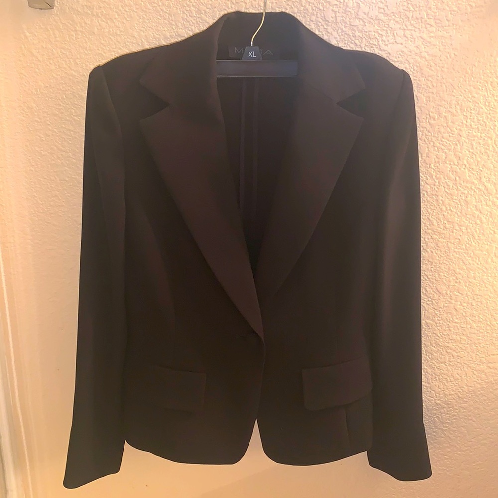 Elegant Black Blazer by [Brand]